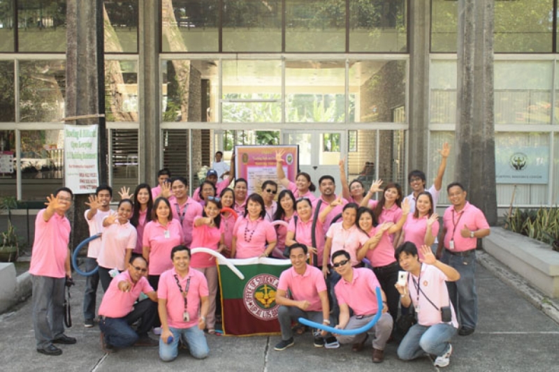 OSA staff pose for a group photo in front of SU Building after the motorcade.