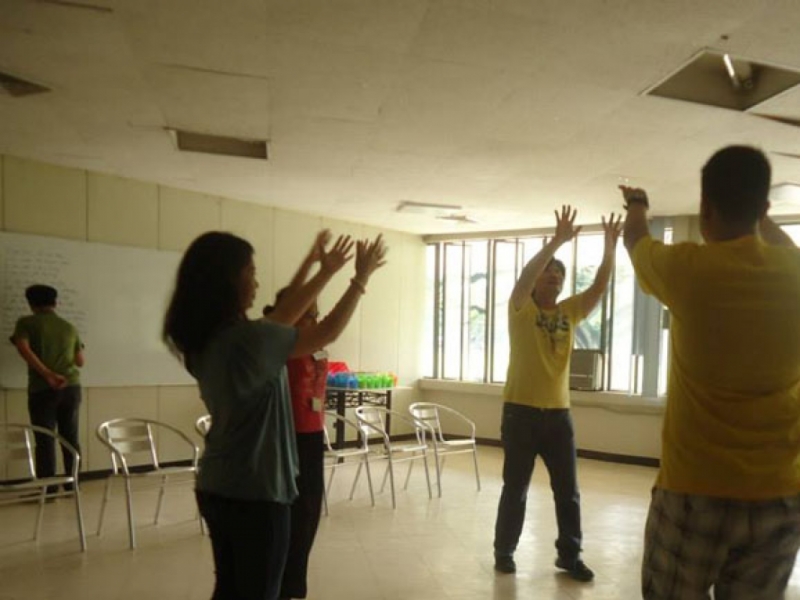 CTD volunteers with the guidance services specialists help students release stress through relaxation exercises.